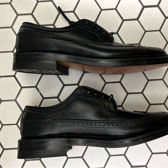 Like new black wing tip dress shoes. - Picture 9 of 16